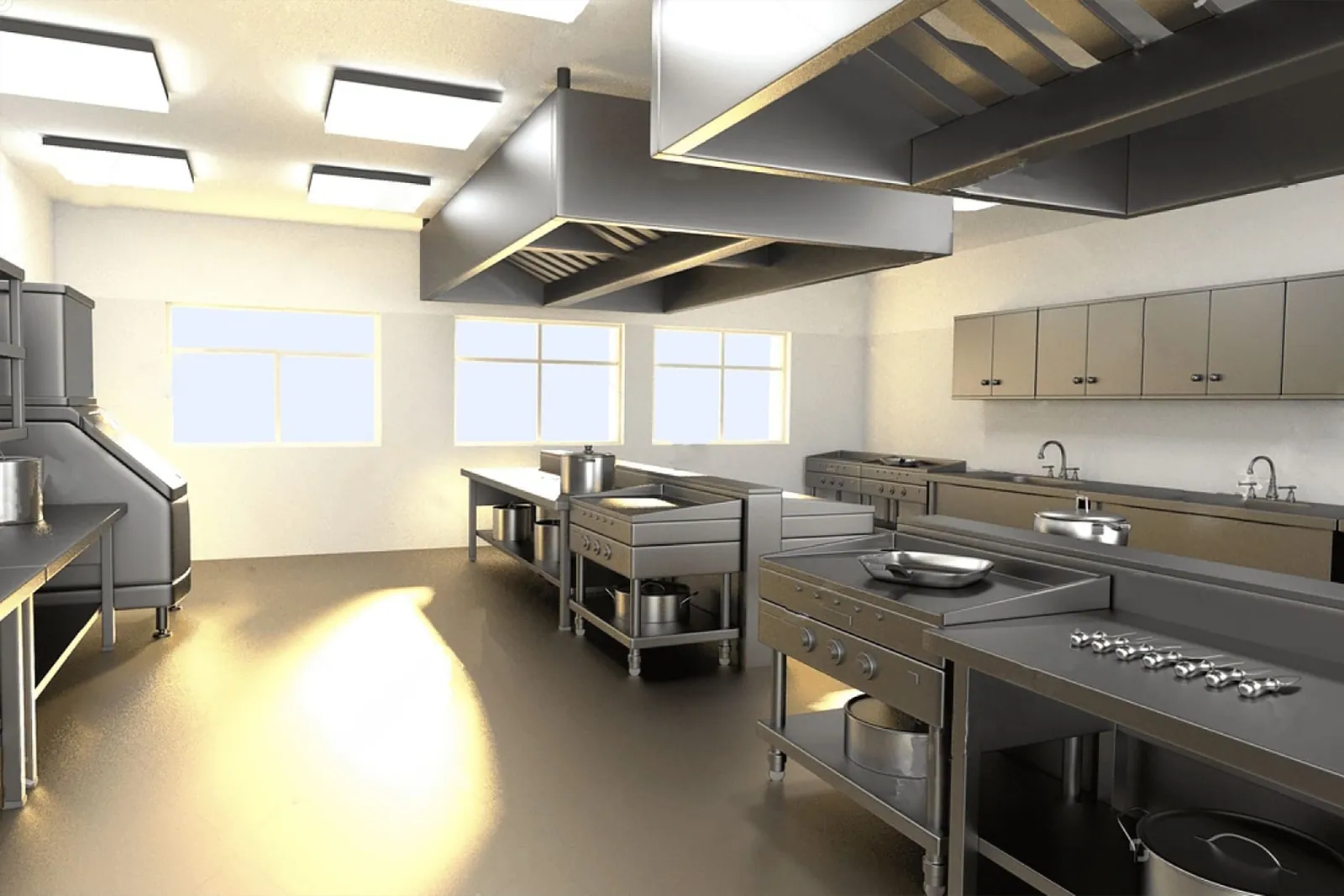 Cocina industrial con campana extractora, como las de bares y restaurantes de Zaragoza